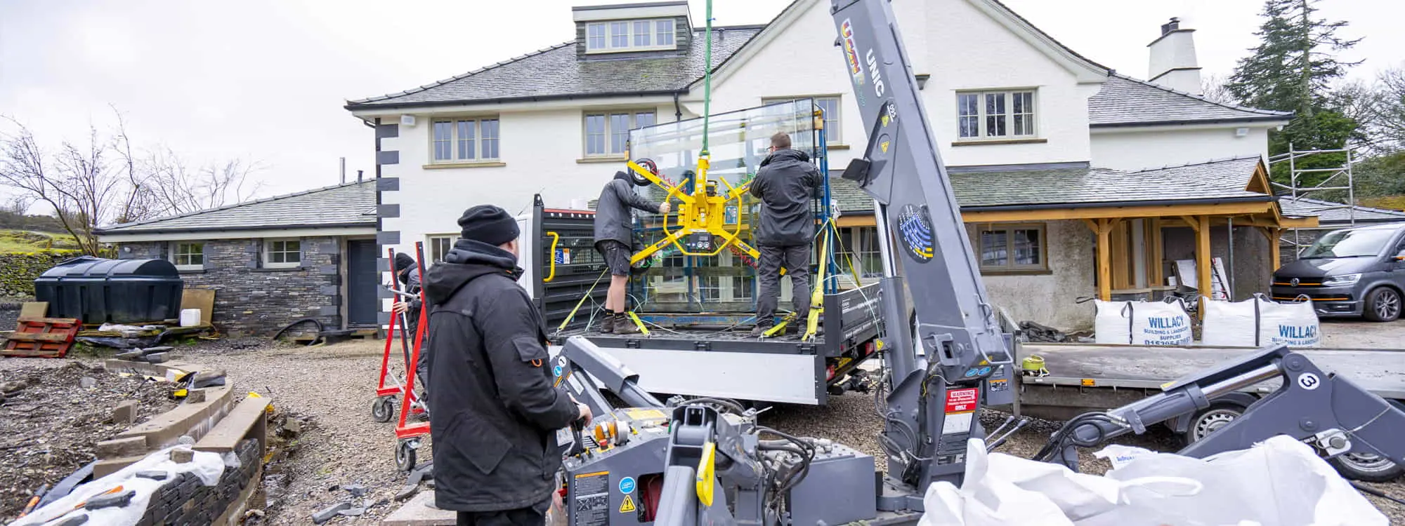 Our team installing a large piece of glass.