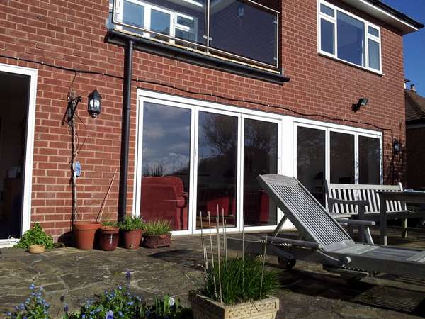 Nantwich, Cheshire: Installation of Classic S1 Aluminium Bi Fold Doors. Triple Glazed - U Value 1.0. Standard RAL White Colour.