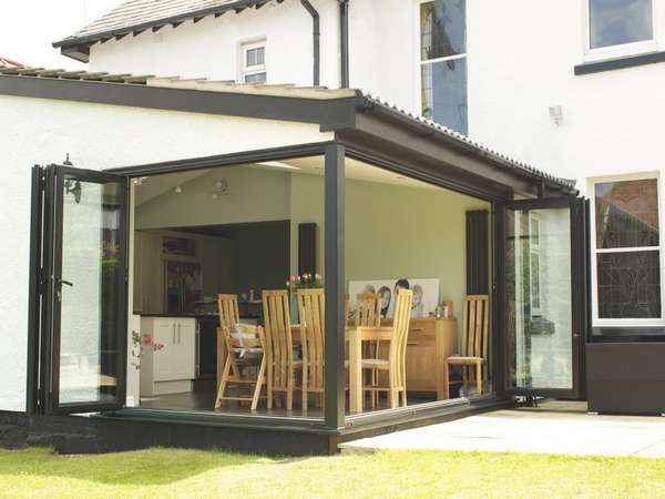 Heswall, Wirral: Installation of Slimfold A10 Aluminium Bi Fold doors - Double glazed - Matt finish, RAL colour 9017.