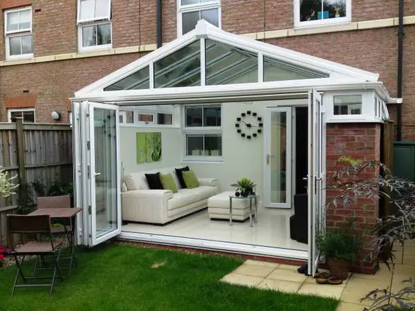 Mr D : WEST DERBY LIVERPOOL : Design and Build Conservatory. R70 PvcU Bi Fold doors - Double glazed manufactured Hytherm Insulative Glass. - Roof K2 with PvcU External Cappings glazed with Celsius one U Value 1.