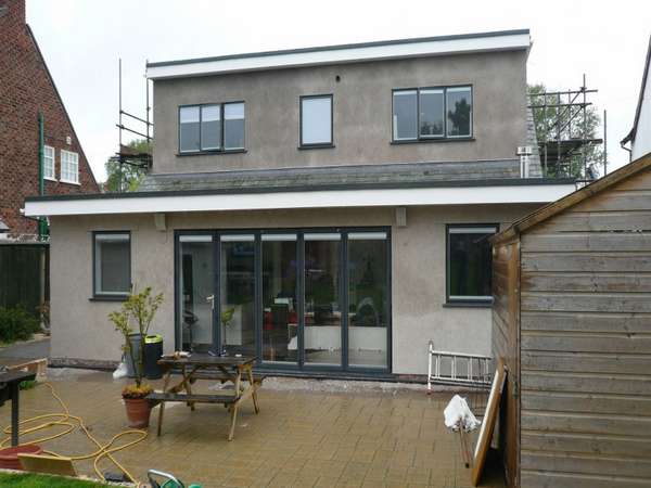 West Kirby Wirral : Installation of Slimfold A10 Bi fold doors double glazed U value 1.4 . 300 series Aluminium windows double glazed. Morley Internal blinds to all glass units