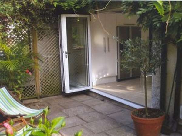 Mr A: Formby: Installation of white Classic S1 bi fold doors with Double glazed Hytherm Double glazed units