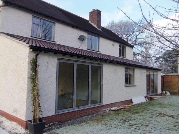 Mr & Mrs V. Burton South Wirral. Installation of Cenor C1 Triple Glazed Bi Fold doors U value .75 Ral 7040. Windows Allstyle Heritage