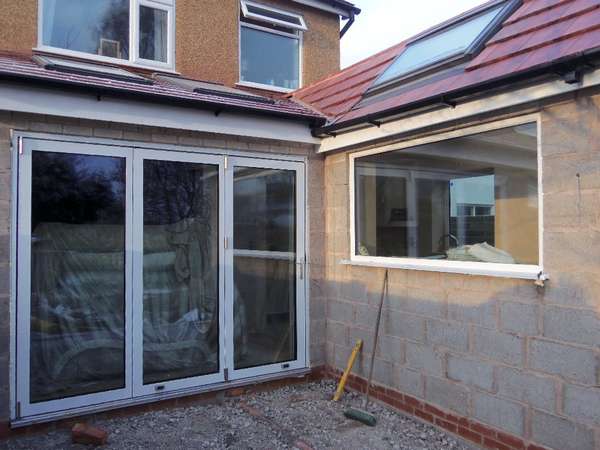 Mrs F. Heswall Wirral. : Installation of triple Glazed Centor C1 Bi Fold doors with Allstyle triple glazed fixed frame - standard white