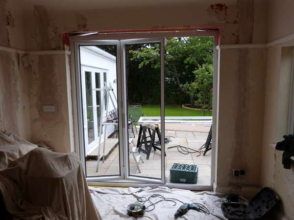 SALE , MANCHESTER. Biulding alteration , Including installing of lintels and plaster work to install Allstyle Polyester Powder Coated aluminium bi folding doors